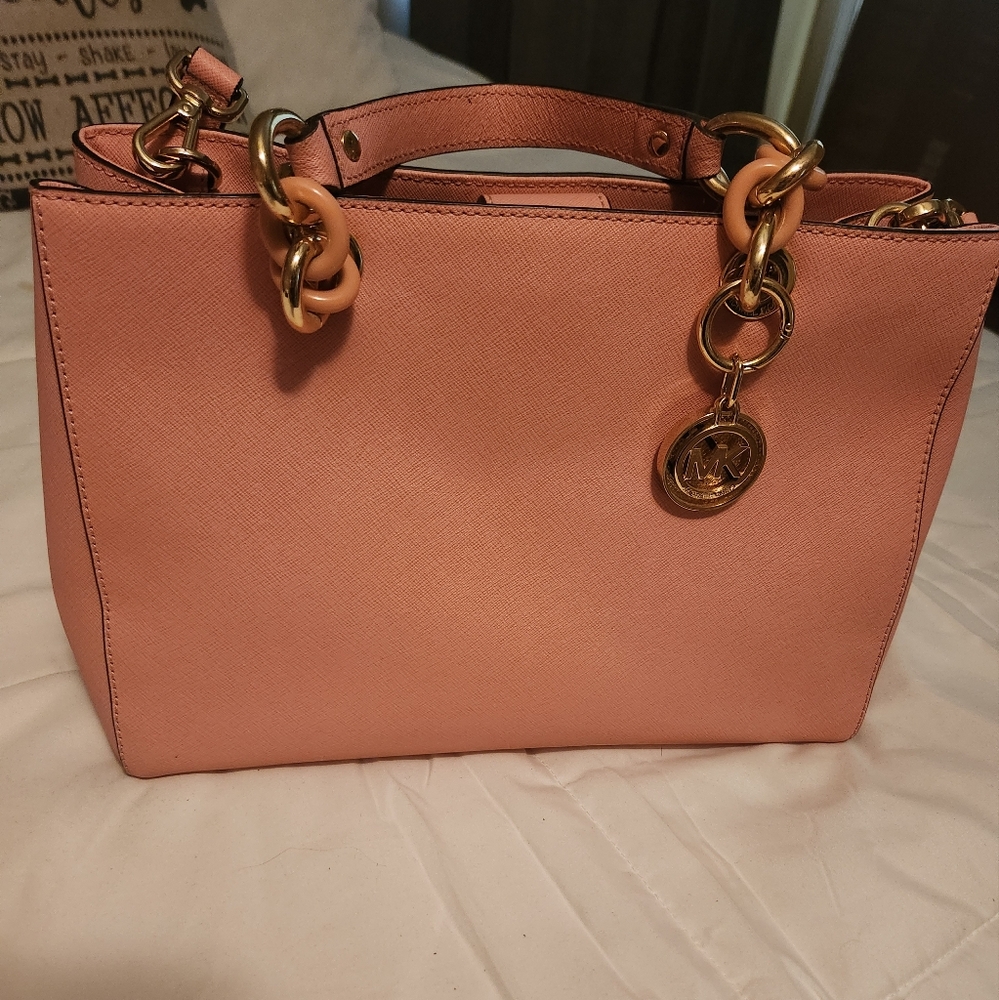 MK purse with detachable strap.